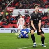 Andrew Moran of Blackburn Rovers celebrates after scoring the team's second goal during the Sky Bet Championship match between Stoke City and Blackburn Rovers at Bet365 Stadium on November 25, 2023 in Stoke on Trent, England. (Photo by Jess Hornby/Getty Images)