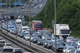 National Highways will shut the M25 in both directions between junctions 10 (A3 Wisley) and 11 (A320 Chertsey Interchange) from 9pm on Friday March, 15 to 6am on Monday, March 18 to demolish the Clearmount bridleway bridge and install a very large gantry.  (Photo by JUSTIN TALLIS/AFP via Getty Images)