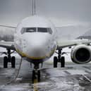 Heavy overnight snow has caused several major UK airports to close their runways. Picture by OLI SCARFF/AFP via Getty Images
