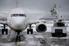 Heavy overnight snow has caused several major UK airports to close their runways. Picture by OLI SCARFF/AFP via Getty Images