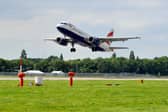 A British Airways flight lands at London Gatwick airport. Pic S Robards SR2108251