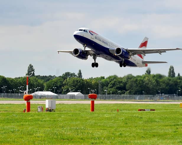 A British Airways flight lands at London Gatwick airport. Pic S Robards SR2108251