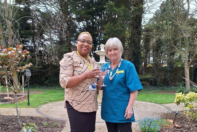 Rose with Tupwood Gate manager, Busi Mudimbu