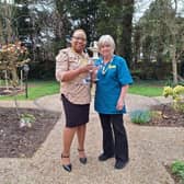 Rose with Tupwood Gate manager, Busi Mudimbu