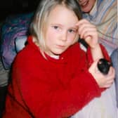 Mollie as a youngster with one of her pet rats - Animal News Agency