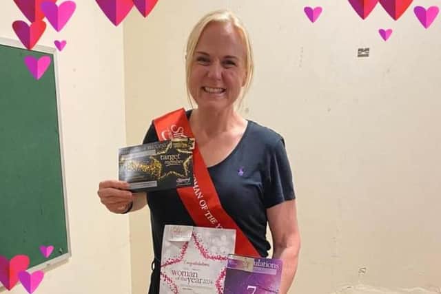 Celebrating achieving her 7 stone loss.