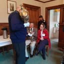 The Mayor showcases official regalia to visitors