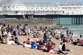 Beach-goers bask in bank holiday sun in Brighton. Photo: Eddie Mitchell
