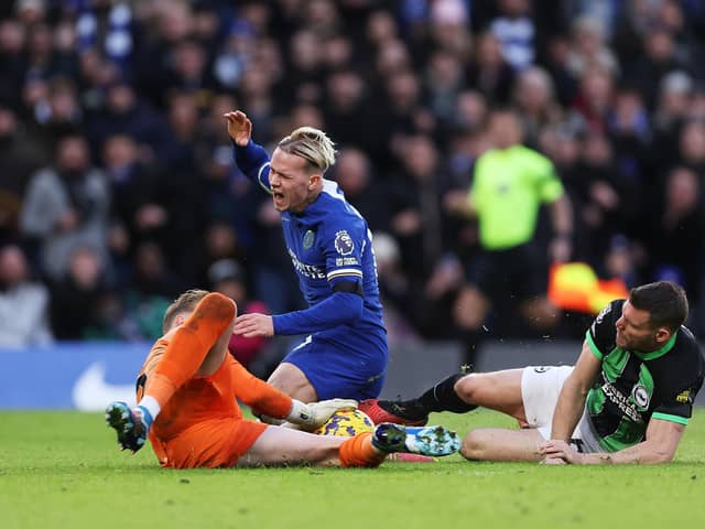 Mykhaylo Mudryk of Chelsea is fouled by James Milner of Brighton & Hove Albion, leading to a penalty awarded to Chelsea FC during the Premier League match between Chelsea FC and Brighton & Hove Albion at Stamford Bridge on December 03, 2023 in London, England. (Photo by Alex Pantling/Getty Images)