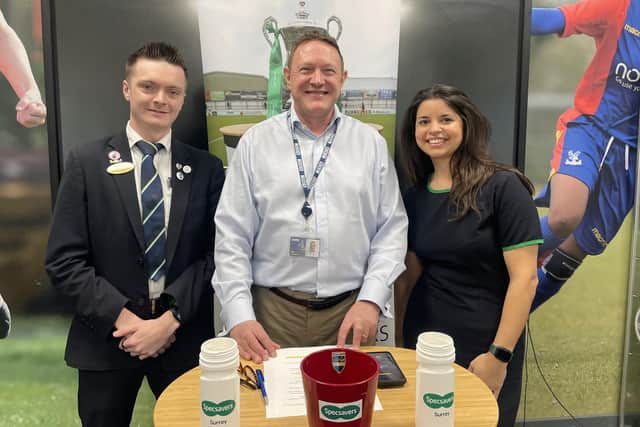 Davinia Hadley, practice manager at Specsavers Dorking, with optical advisor Fletcher O'Riordan (left) and BBC Surrey sports editor Tim Durrans at the latest Specsavers Surrey Senior Cup draw in January 2025