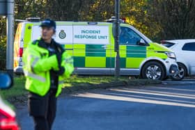 An ambulance has passed through the police cordon outside London Gatwick Airport following the discovery of a ‘suspected prohibited item’. Picture by Eddie Mitchell
