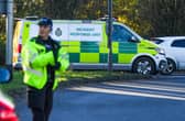 An ambulance has passed through the police cordon outside London Gatwick Airport following the discovery of a ‘suspected prohibited item’. Picture by Eddie Mitchell