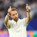 Gareth Southgate, Head Coach of England, acknowledges the fans after the team's victory and progression to the quarter final in the UEFA EURO 2024 round of 16 match between England and Slovakia at Arena AufSchalke on June 30, 2024 in Gelsenkirchen, Germany. (Photo by Carl Recine/Getty Images)