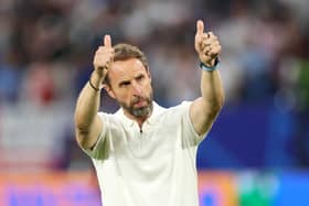 Gareth Southgate, Head Coach of England, acknowledges the fans after the team's victory and progression to the quarter final in the UEFA EURO 2024 round of 16 match between England and Slovakia at Arena AufSchalke on June 30, 2024 in Gelsenkirchen, Germany. (Photo by Carl Recine/Getty Images)