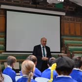 Andrew Griffith MP with primary school pupils at Houses of Parliament