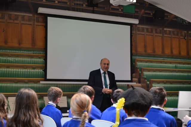 Andrew Griffith MP with primary school pupils at Houses of Parliament