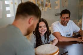 A team smiling at a Best Office Baker entry.