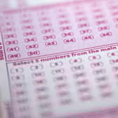 A woman from Surrey has won £1,000,000 on the National Lottery after matching five main numbers and the bonus ball in the Lotto draw on Saturday, May 31. Picture by SHAUN CURRY/AFP via Getty Images