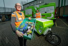 Mark Richardson (left) and Rick Miller, of FareShare Sussex and Surrey, with Rampion fund e-vehicles. Photo: FareShare Sussex