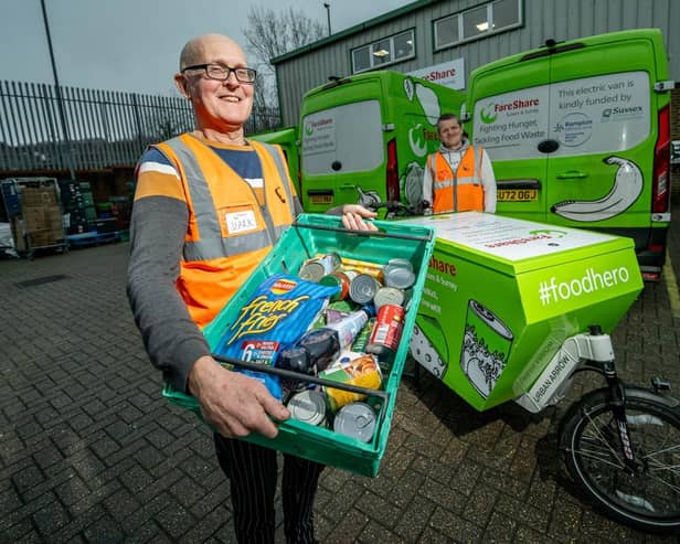 Mark Richardson (left) and Rick Miller, of FareShare Sussex and Surrey, with Rampion fund e-vehicles. Photo: FareShare Sussex