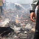 Debris is seen at the site where Air India flight 171 crashed in a residential area near the airport in Ahmedabad. Picture: Sam Panthaky/AFP via Getty Images