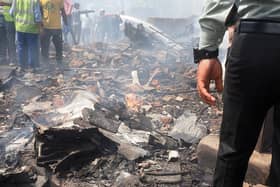Debris is seen at the site where Air India flight 171 crashed in a residential area near the airport in Ahmedabad on June 12, 2025. The London-bound passenger plane crashed on June 12 in India's western city of Ahmedabad with 242 on board, aviation officials said in what the airline called a "tragic accident". (Photo by Sam PANTHAKY / AFP) (Photo by SAM PANTHAKY/AFP via Getty Images)