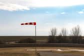 Strong winds can make driving unpredictable, especially on open roads or when overtaking larger vehicles so you should reduce your speed to stay in control.