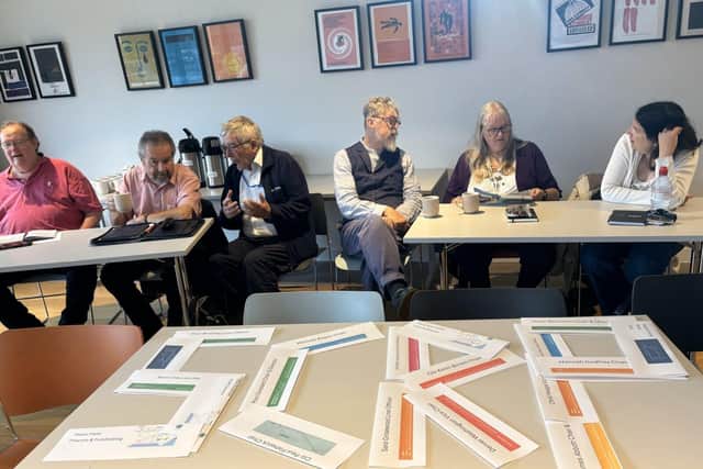 Staff and volunteers from Southeast Communities Rail Partnership discuss their future plans