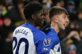 Jack Hinshelwood of Brighton & Hove Albion celebrates scoring his team's second goal with teammate Carlos Baleba during the Premier League match between Brighton & Hove Albion and Brentford FC at American Express Community Stadium on December 06, 2023 in Brighton, England. (Photo by Steve Bardens/Getty Images)