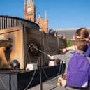 A 25-ft-long animatronic ‘Hungarian Horntail’ dragon surprises locals in [insert city] to mark the launch of the new ‘Triwizard Tournament – Making of Champions’ feature at Warner Bros. Studio Tour London, which celebrates the 20th anniversary of ‘Harry Potter and the Goblet of Fire’. Complete with a moving head, eyes and mouth, the ‘captured’ 1.3 tonne hydraulic dragon model roars and bares its teeth. The 'Triwizard Tournament – Making of Champions’ feature will run from May 15th to 8th September 2025.