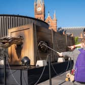 A 25-ft-long animatronic ‘Hungarian Horntail’ dragon surprises locals in [insert city] to mark the launch of the new ‘Triwizard Tournament – Making of Champions’ feature at Warner Bros. Studio Tour London, which celebrates the 20th anniversary of ‘Harry Potter and the Goblet of Fire’. Complete with a moving head, eyes and mouth, the ‘captured’ 1.3 tonne hydraulic dragon model roars and bares its teeth. The 'Triwizard Tournament – Making of Champions’ feature will run from May 15th to 8th September 2025.