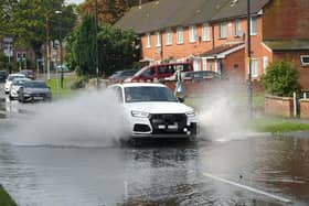 Crawley was among the locations hit by torrential rain, thunder and lightning around 11am.  This has resulted in flooding on roads in and around the town centre. Photo: Eddie Mitchell