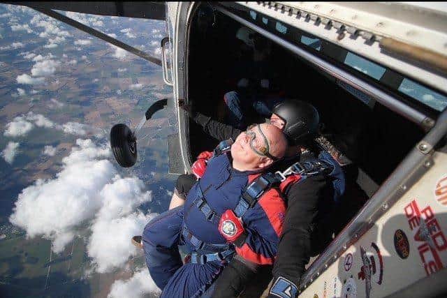 Giles takes on skydive for dementia charity