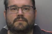 Edward Durlik, 41, of Woking created multiple fake online profiles to gain his victims’ trust. Picture courtesy of Surrey Police