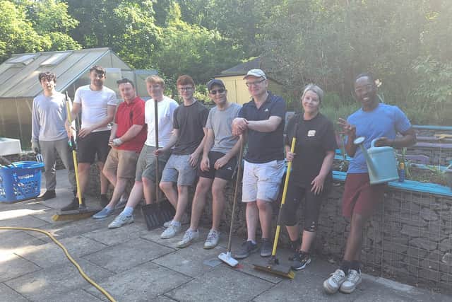 Volunteers from MGI Midgley Snelling taking a well-earned break at the White Lodge in Chertsey.