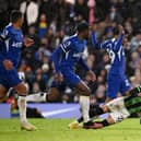 Kaoru Mitoma of Brighton & Hove Albion clashes with Ian Maatsen of Chelsea during the Premier League match between Chelsea FC and Brighton & Hove Albion at Stamford Bridge on December 03, 2023 in London, England. (Photo by Mike Hewitt/Getty Images)
