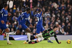Kaoru Mitoma of Brighton & Hove Albion clashes with Ian Maatsen of Chelsea during the Premier League match between Chelsea FC and Brighton & Hove Albion at Stamford Bridge on December 03, 2023 in London, England. (Photo by Mike Hewitt/Getty Images)