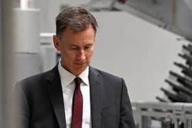At least 11 Cabinet ministers would lose seats according to the Telegraph's poll, including Chancellor Jeremy Hunt, whose South West Surrey seat would be lost to the Liberal Democrats. (Photo by OLI SCARFF/POOL/AFP via Getty Images)