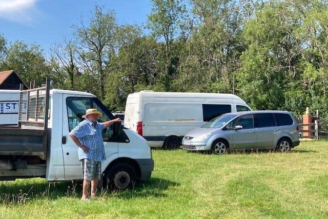William Lewis In His Field With Cars For Ukraine. (Credit Christine Godfrey)