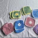 Baby bonding squares, knitted by residents