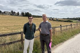 Campaigners, Matt Dunn (left) and John Mumford (right), in front of the proposed development site. (Credit: Emily Dalton/LDRS)