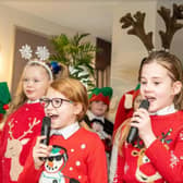 In the spirit of spreading festive cheer, homeowners at a Virginia Water Retirement Living Plus development have been treated to a special performance by a local school choir. Picture: submitted
