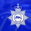 A Surrey Police officer is to appear in court charged with stalking